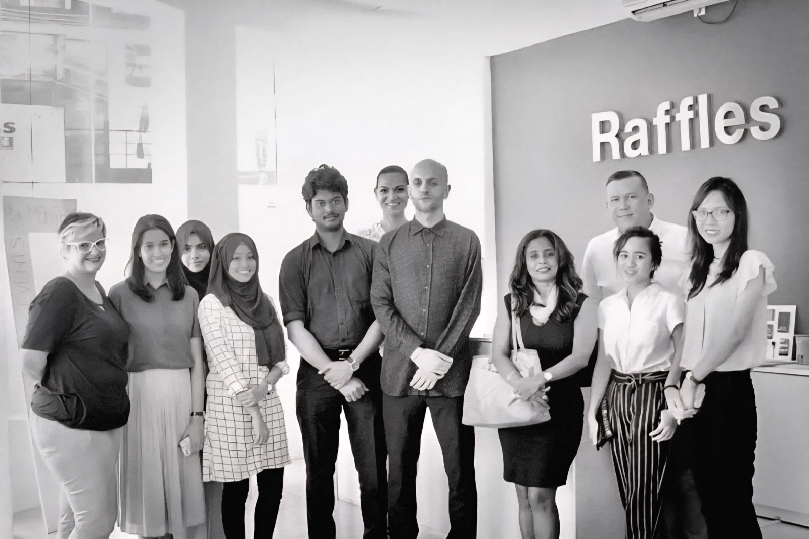 James with students and faculty at Raffles Design Institute